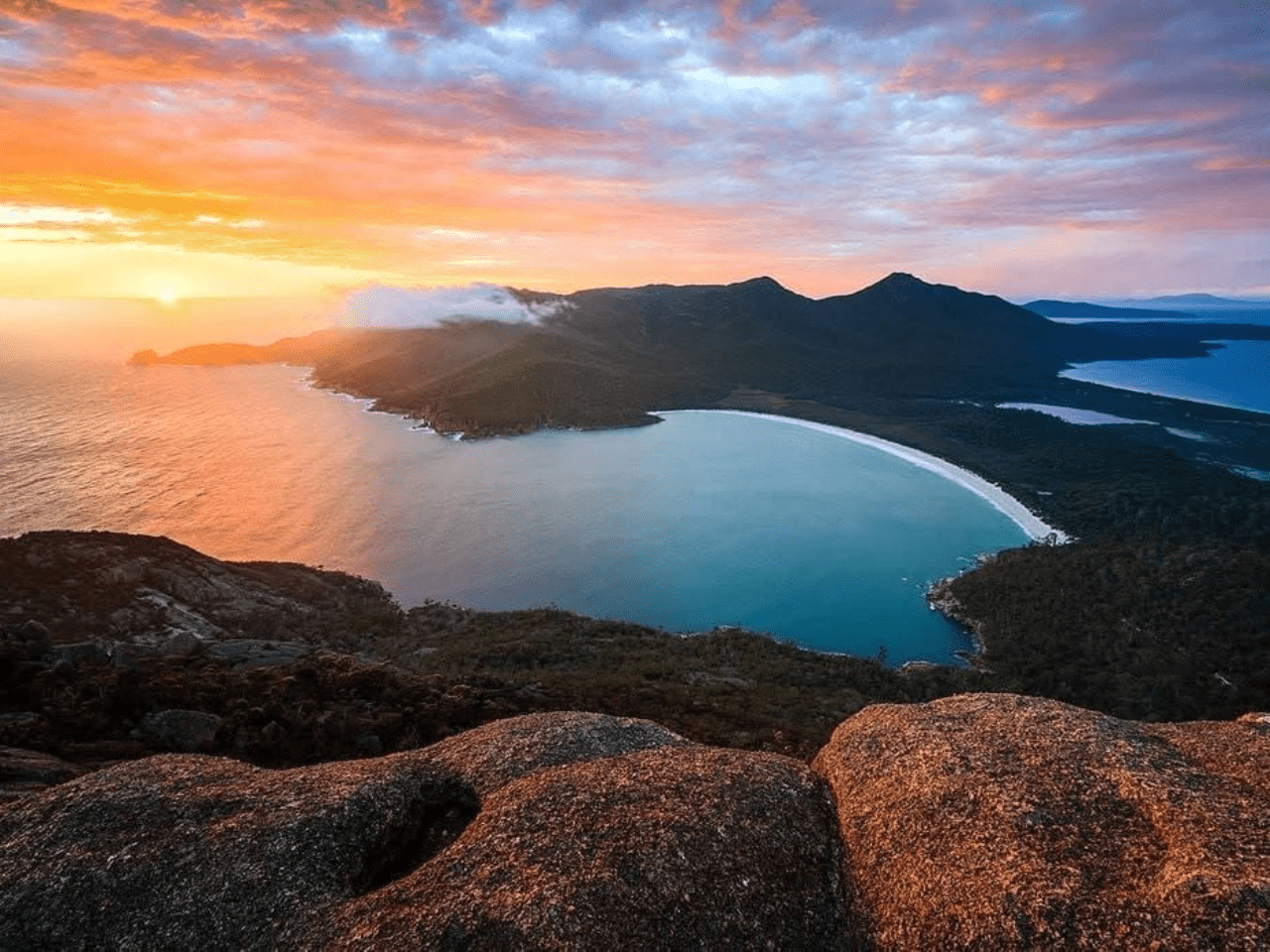 Pivot Trip small-group Australia tour for gay men gay travel — Freycinet Wine Glass Bay overlook