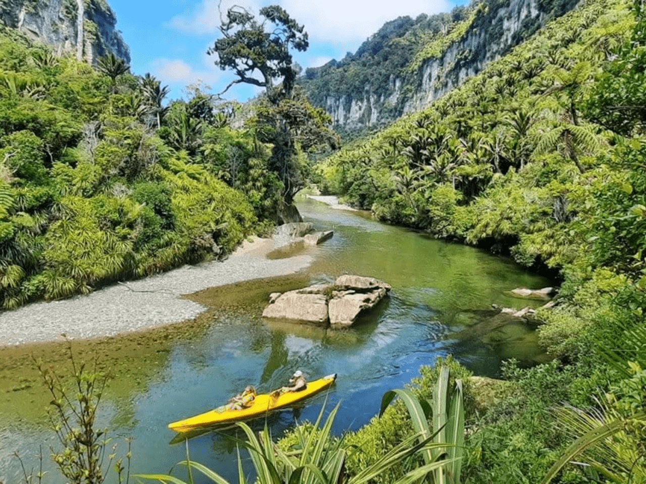 Pivot Trip small-group New Zealand tour for gay men — Kayak Punakaiki River