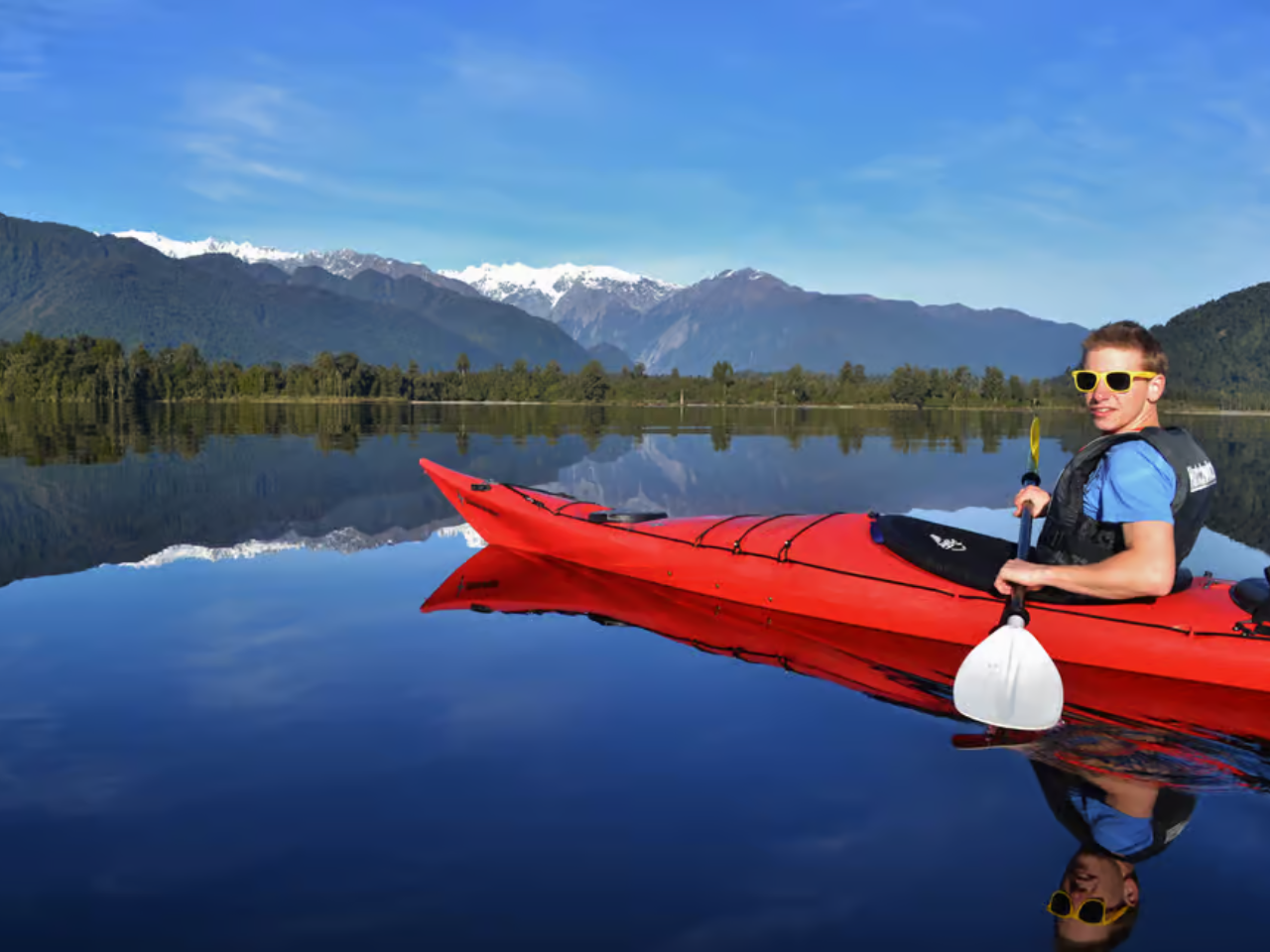 Pivot Trip small-group New Zealand tour for gay men — Franz Josef guided kayak tour adventure