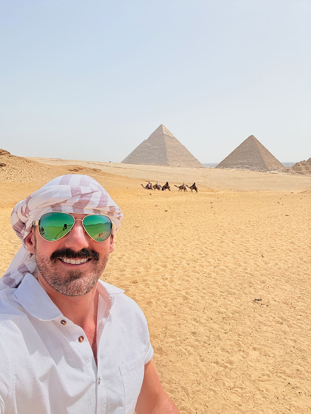 Cory with the Egyptian pyramids in the background