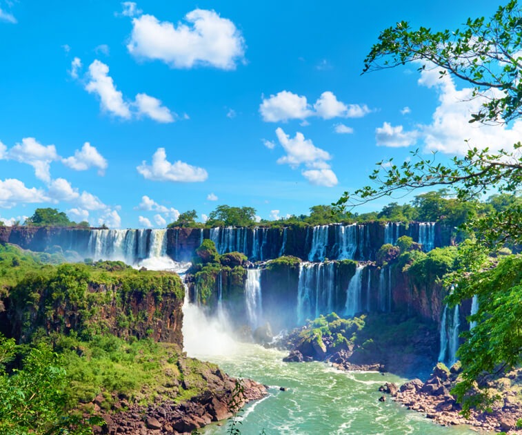 A beautiful view of Iguazú Falls on the border between Argentina and Brazil - Pivot Trip South America - gay travel adventure for gay men