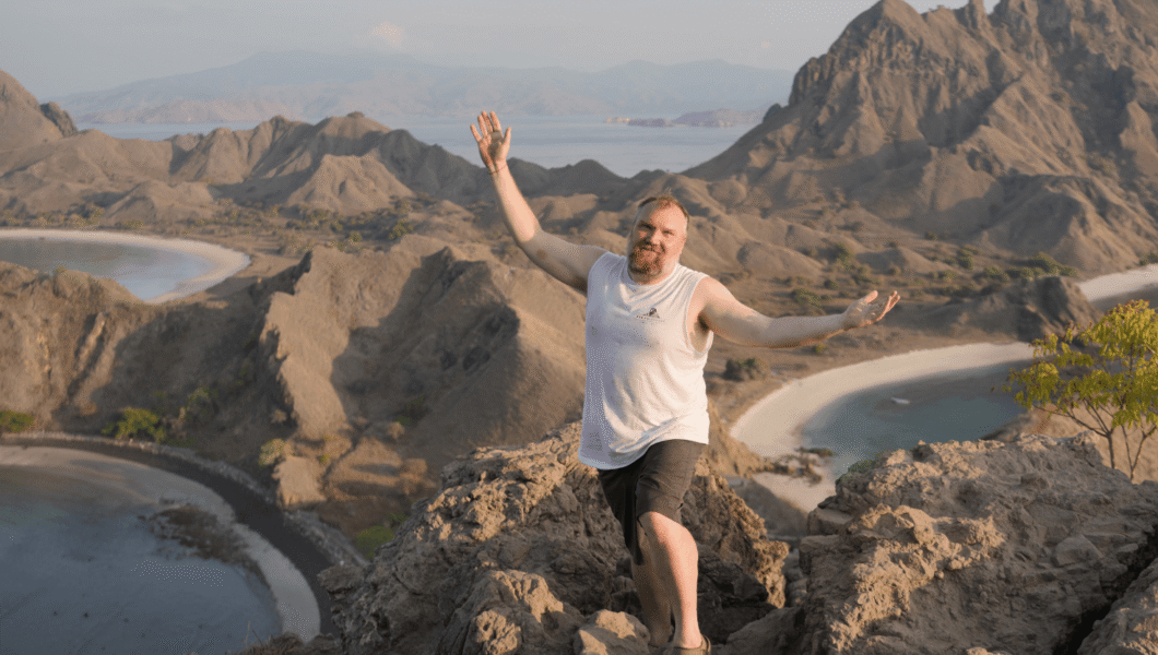 testimonial-chad Chad on top of a mountain on a Pivot Trip