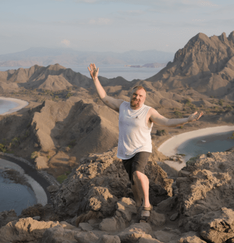 testimonial-chad Chad on top of a mountain on a Pivot Trip