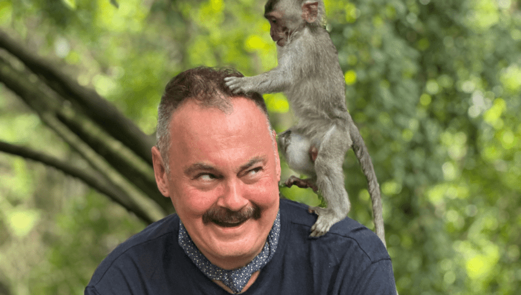 testimonial-mike A photo of Mike with a Monkey on a Pivot Trip