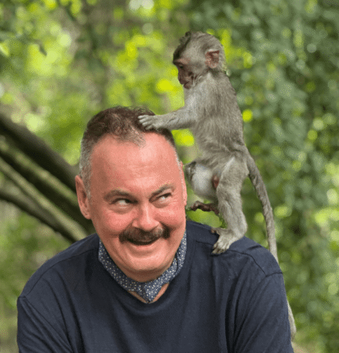 testimonial-mike A photo of Mike with a Monkey on a Pivot Trip