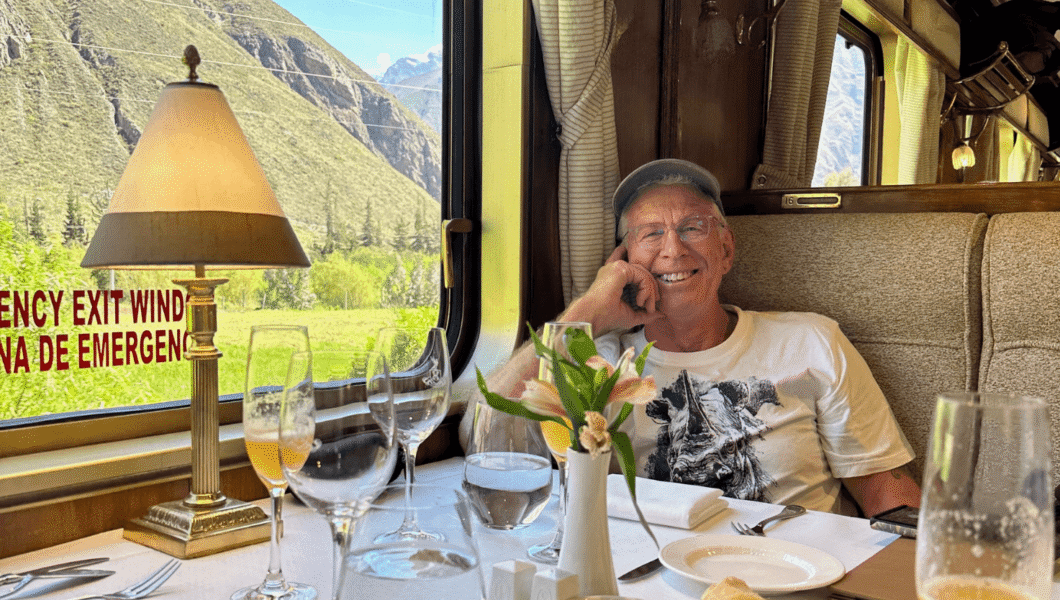 testimonial-paul A Photo of Paul smiling in a train car on a Pivot Trip
