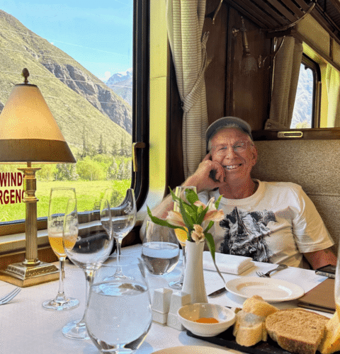 testimonial-paul A Photo of Paul smiling in a train car on a Pivot Trip