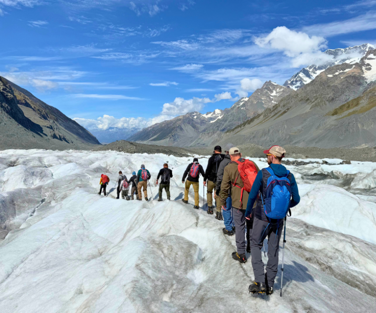 Pivot Trip small-group New Zealand tour for gay men — hiking the Tasman Glacier at Aoraki/Mount Cook