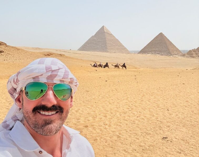 Cory Calvin at Pyramids of Giza - tour guide for Pivot Trip - gay trip to Egypt Nile River