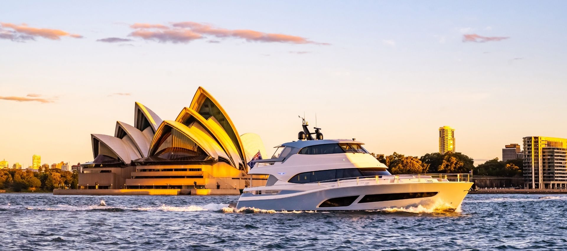 Sydney opera house with yacht in harbour for gay trip for gay men with pivot trip in Australia